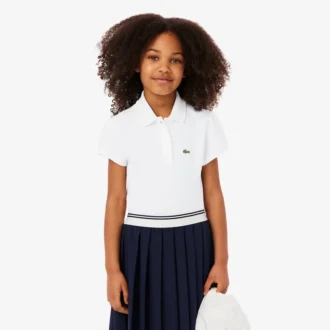 Polo de piqué con cuello festoneado para niña