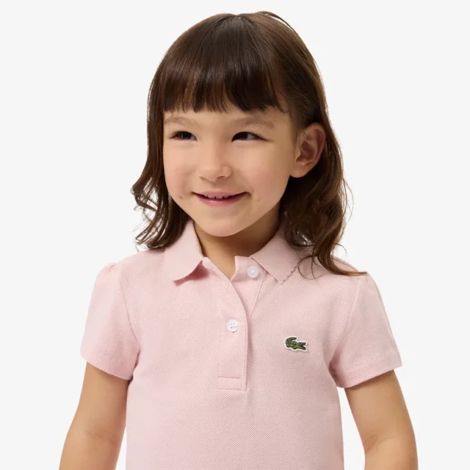 Polo de piqué con cuello festoneado para niña