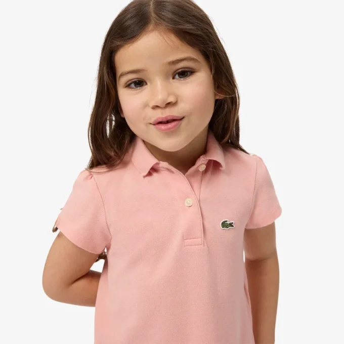 Polo de piqué con cuello festoneado para niña