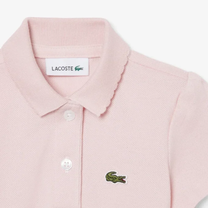 Polo de piqué con cuello festoneado para niña