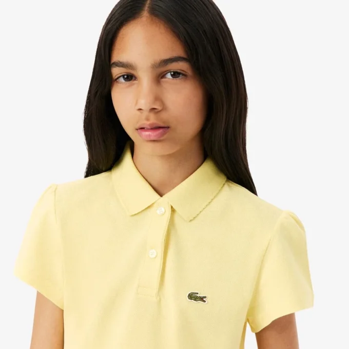 Polo de piqué con cuello festoneado para niña