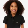 Polo de piqué con cuello festoneado para niña
