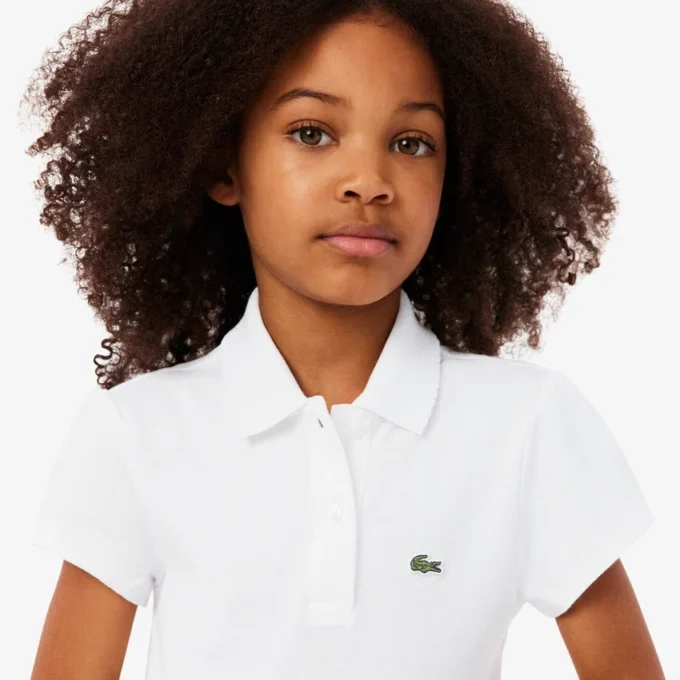 Polo de piqué con cuello festoneado para niña