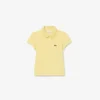 Polo de piqué con cuello festoneado para niña