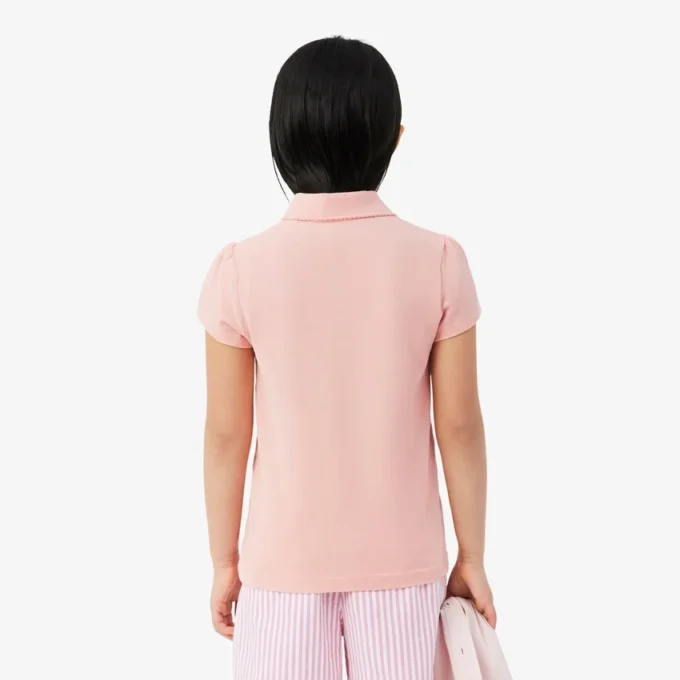 Polo de piqué con cuello festoneado para niña