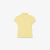 Polo de piqué con cuello festoneado para niña