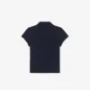 Polo de piqué con cuello festoneado para niña