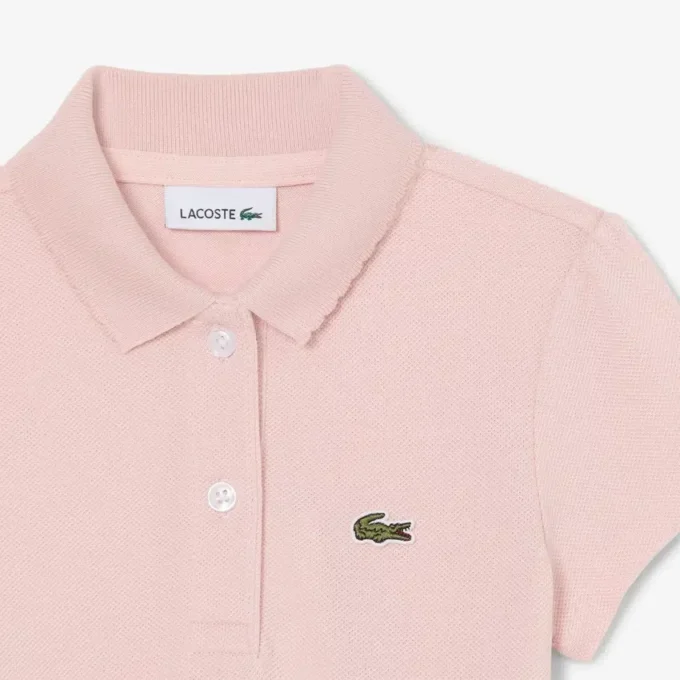 Polo de piqué con cuello festoneado para niña