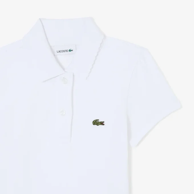 Polo de piqué con cuello festoneado para niña