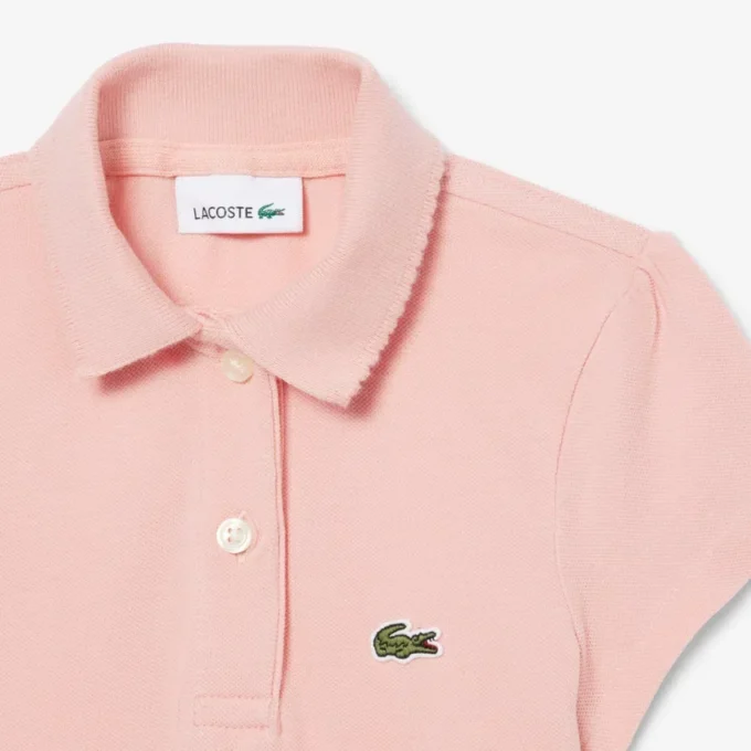 Polo de piqué con cuello festoneado para niña