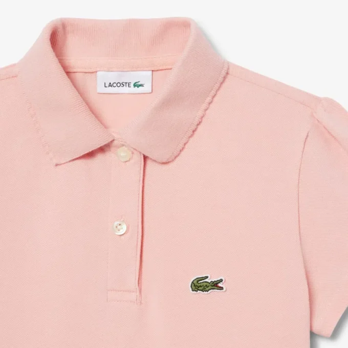 Polo de piqué con cuello festoneado para niña