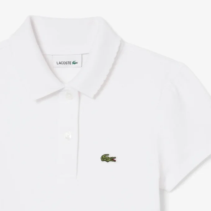 Polo de piqué con cuello festoneado para niña
