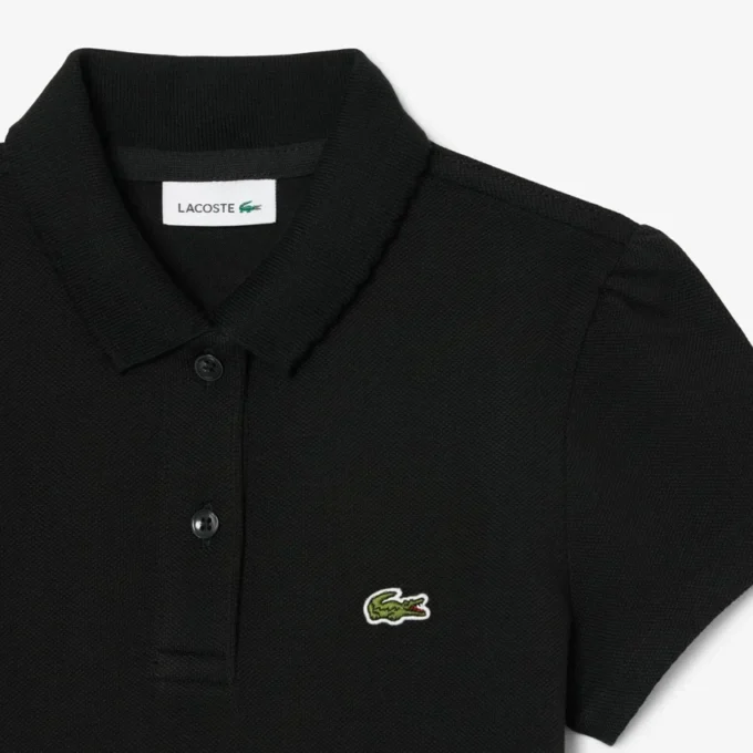 Polo de piqué con cuello festoneado para niña