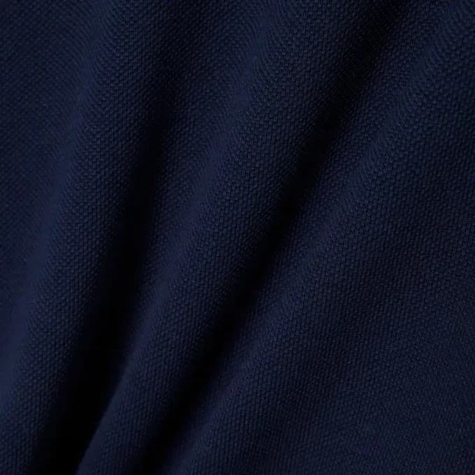 Polo de piqué con cuello festoneado para niña