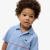 Polo de piqué con rayas de la marca Ultra Dry