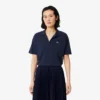 Polo de piqué de corte holgado para mujer