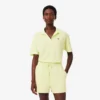 Polo de piqué de corte holgado para mujer
