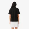 Polo de piqué de corte holgado para mujer