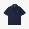 Polo de piqué de corte holgado para mujer