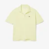 Polo de piqué de corte holgado para mujer