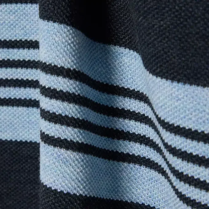 Polo de rugby de piqué a rayas de corte holgado