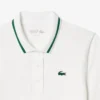 Polo de tenis con cuello a rayas y protección UV para mujer