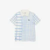 Polo de tenis de piqué a rayas para niño