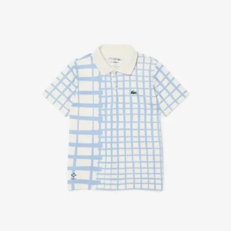 Polo de tenis de piqué a rayas para niño