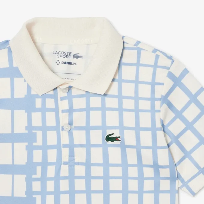 Polo de tenis de piqué a rayas para niño