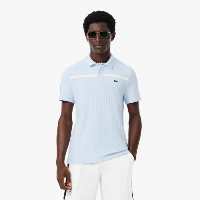 Polo de tenis Heritage para hombre con detalle de insignia Ultra Dry