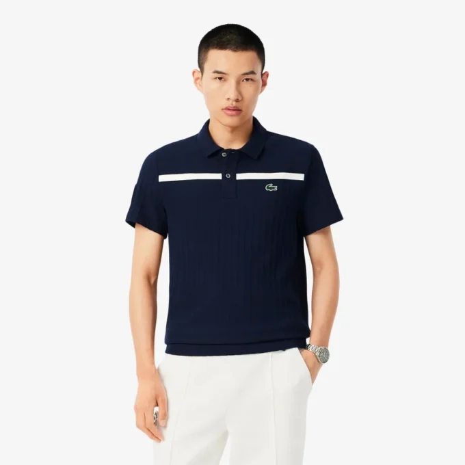 Polo de tenis Heritage para hombre con detalle de insignia Ultra Dry