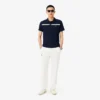 Polo de tenis Heritage para hombre con detalle de insignia Ultra Dry