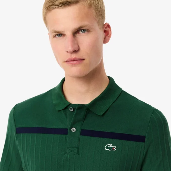 Polo de tenis Heritage para hombre con detalle de insignia Ultra Dry