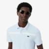 Polo de tenis Heritage para hombre con detalle de insignia Ultra Dry