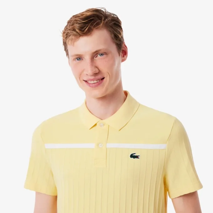 Polo de tenis Heritage para hombre con detalle de insignia Ultra Dry