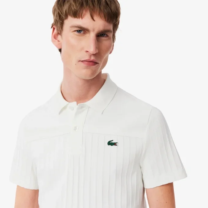 Polo de tenis Heritage para hombre con detalle de insignia Ultra Dry