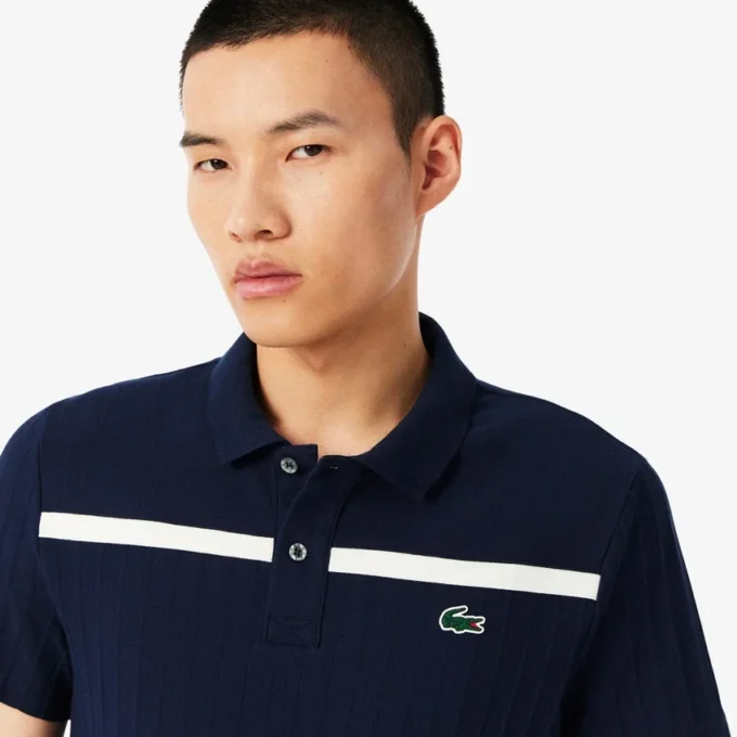Polo de tenis Heritage para hombre con detalle de insignia Ultra Dry