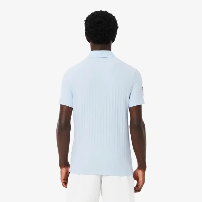 Polo de tenis Heritage para hombre con detalle de insignia Ultra Dry