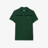 Polo de tenis Heritage para hombre con detalle de insignia Ultra Dry