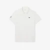Polo de tenis Heritage para hombre con detalle de insignia Ultra Dry