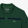Polo de tenis Heritage para hombre con detalle de insignia Ultra Dry