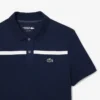 Polo de tenis Heritage para hombre con detalle de insignia Ultra Dry
