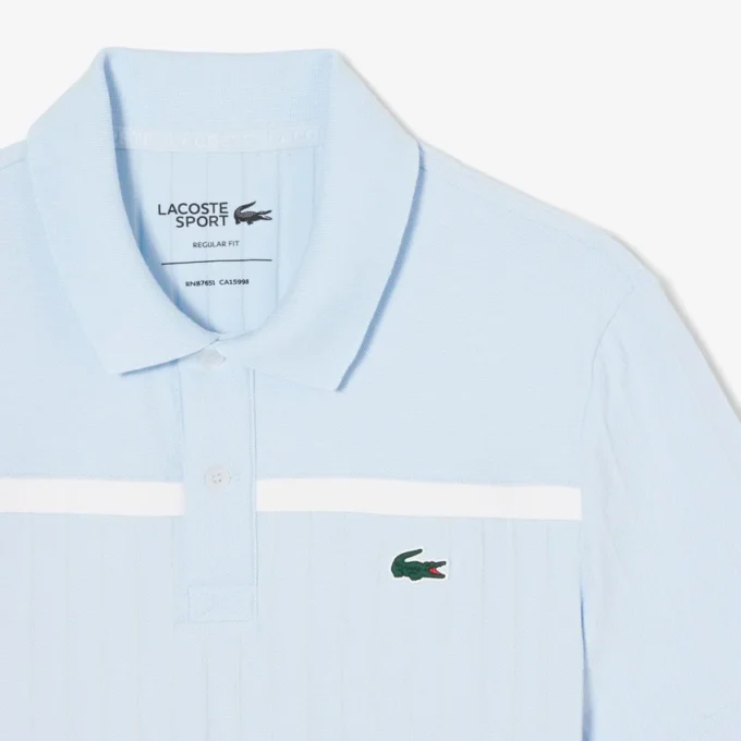 Polo de tenis Heritage para hombre con detalle de insignia Ultra Dry