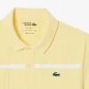 Polo de tenis Heritage para hombre con detalle de insignia Ultra Dry