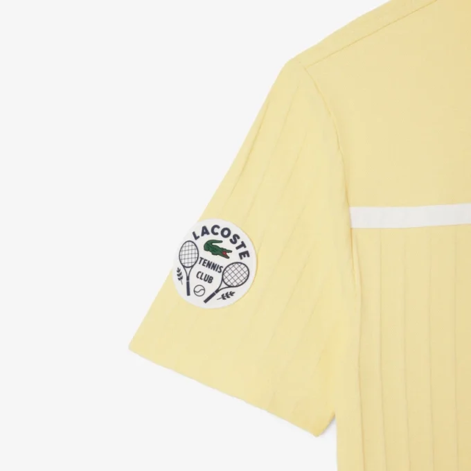 Polo de tenis Heritage para hombre con detalle de insignia Ultra Dry