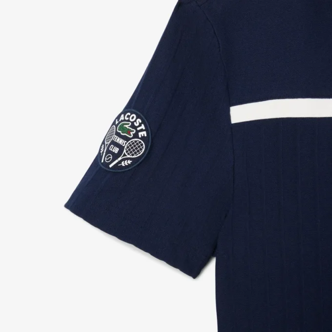 Polo de tenis Heritage para hombre con detalle de insignia Ultra Dry