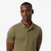 Polo de Tenis Ultra Dry con rayas de la marca para hombre