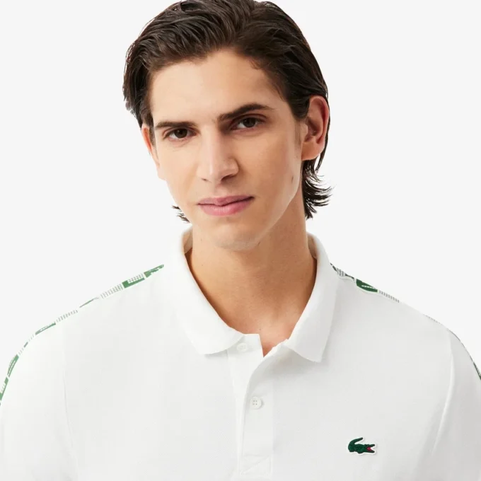 Polo de Tenis Ultra Dry con rayas de la marca para hombre