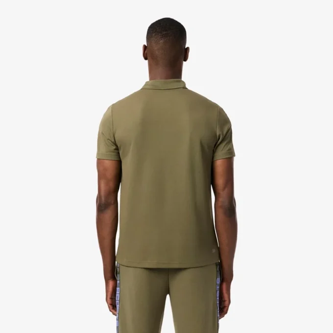 Polo de Tenis Ultra Dry con rayas de la marca para hombre