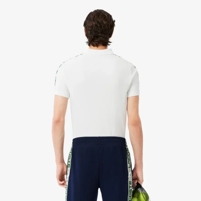 Polo de Tenis Ultra Dry con rayas de la marca para hombre